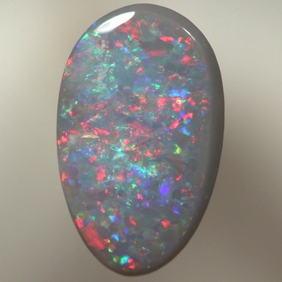 SOLID SEMI BLACK OPAL Bright sparkling reds over green and blue